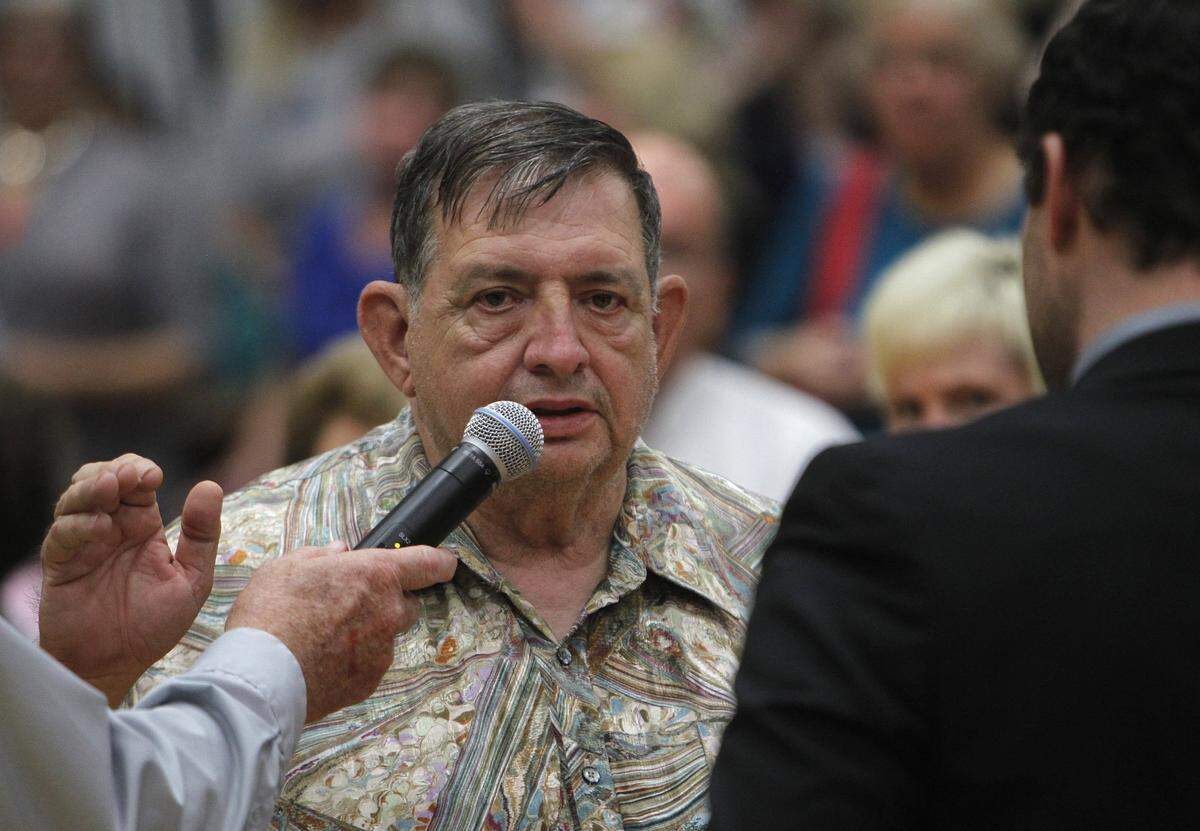 This file photo shows Joe Hubbard being sworn into office as a Belleville Township trustee in 2013.