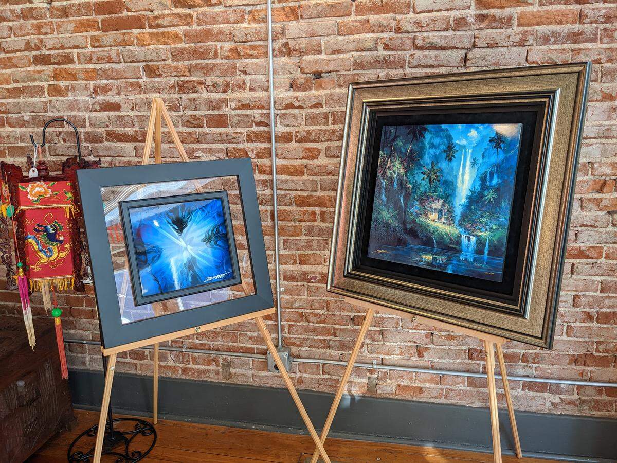 Art by Chris DeRubeis and James Coleman on display at the Voodoo Alligator in Belleville