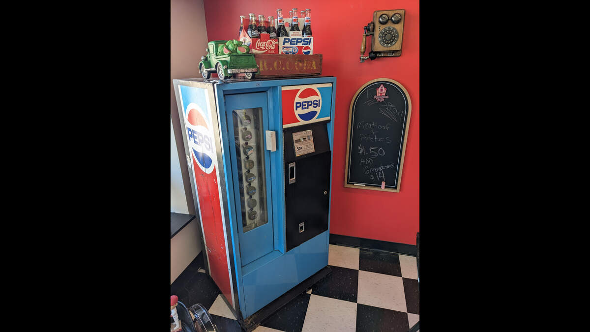 A vintage Pepsi machine at The Sugar Shack Café