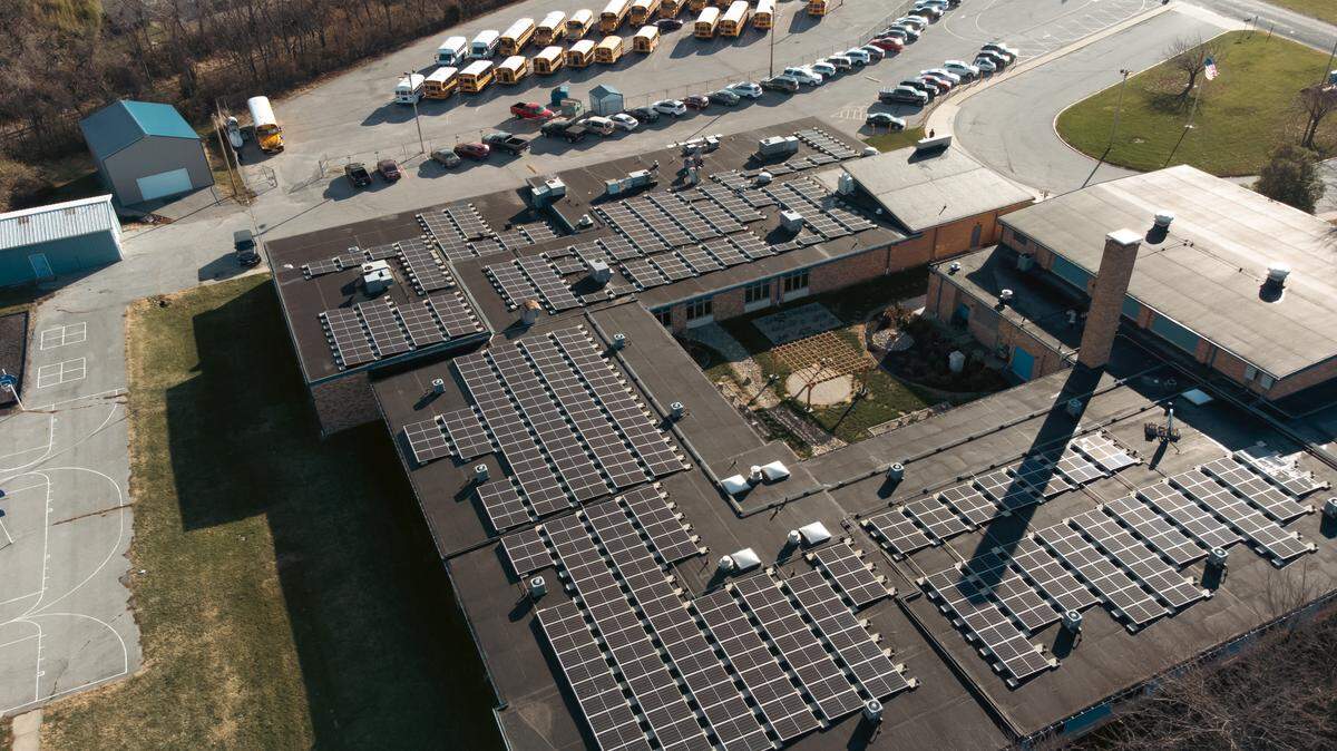 Solar panels sit atop the Harmony-Emge campus in Belleville, Illinois, on Dec. 11, 2023.