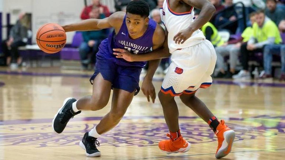 Ray’Sean Taylor drives to the basket against East St. Louis’ Shamon Jefferson during the Prairie Farms Holiday Classic quarterfinals at Collinsville high school in 2017.