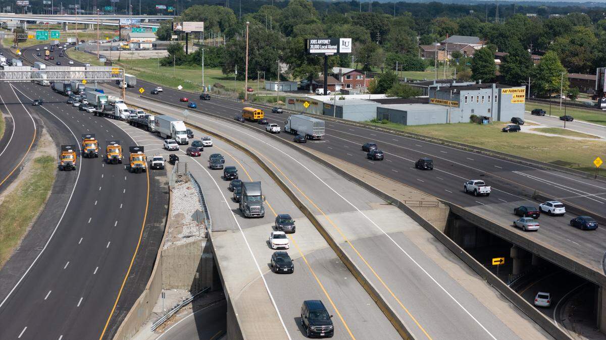 Illinois Department of Transportation trucks block access to southbound Interstate 55 in East St. Louis, Ill. on Sept. 4, 2024, following a fatal motorcycle crash.