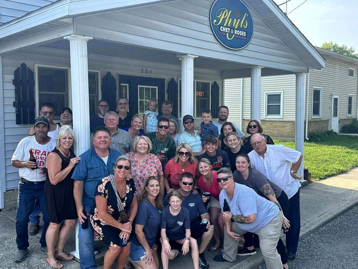 The extended Litteken family gathers in front of Phyl’s Chet & Rose’s Tavern in Marine.