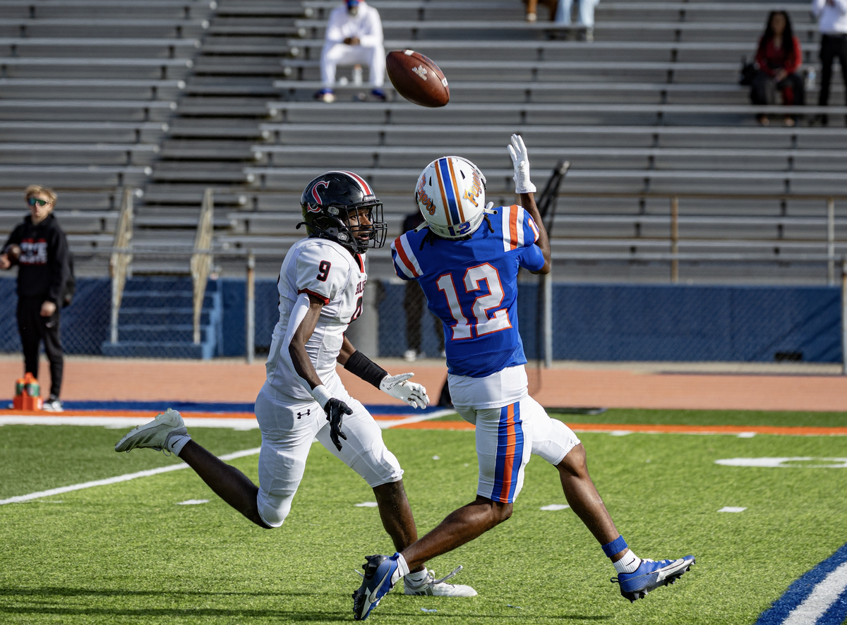 East St. Louis wide receiver Kortez Rupert snags a touchdown pass in 2024. Rupert, who is committed to play at Indiana University, changed his number from 12 to 3 for his senior season.