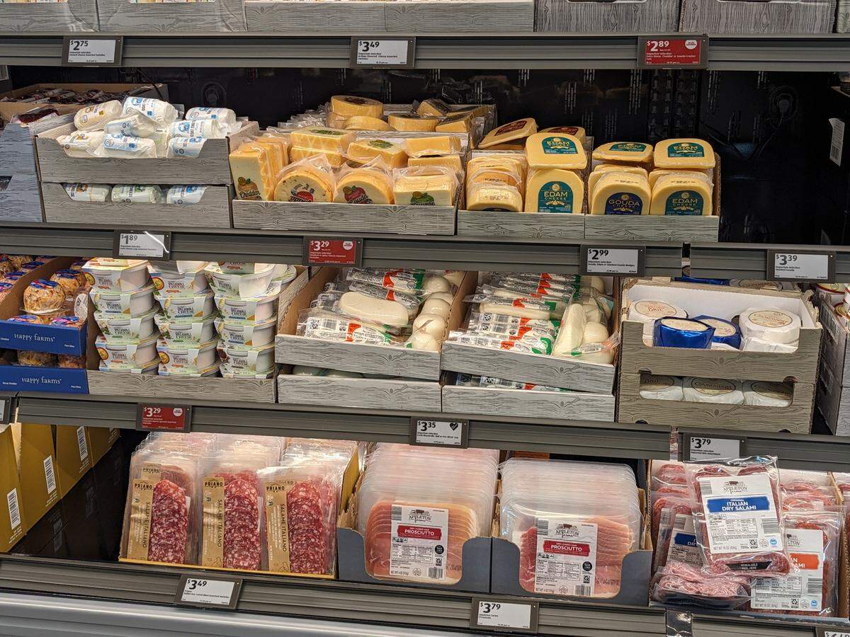 Options in the deli section at Aldi include multiple kinds of cheese and meat.