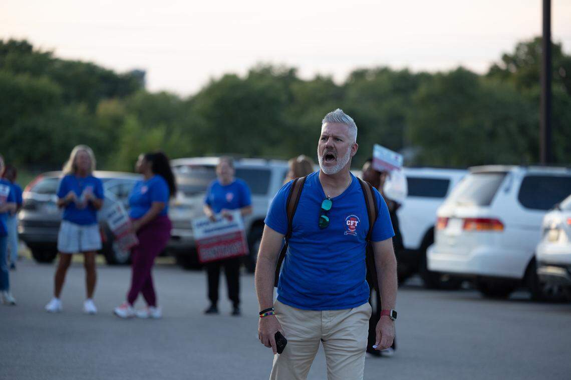 Ray Roskos, the Illinois Federation of Teachers field service director who assists Cahokia Federation of Teachers Local 1272, leads chants advocating for fair contracts outside a September Cahokia school board meeting.