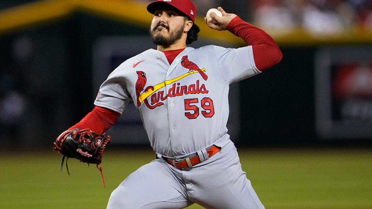 St. Louis Cardinals relief pitcher JoJo Romero (59) throws against the Arizona Diamondbacks during the eighth inning of a baseball game, Tuesday, July 25, 2023, in Phoenix. (AP Photo/Matt York)