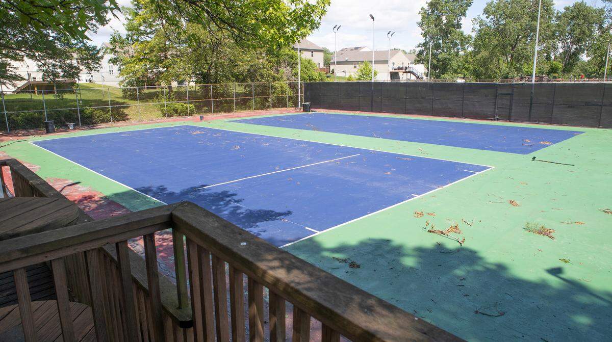 The new owners of Westhaven Pool and Tennis Club in Belleville repainted the tennis courts, which were dirty and covered with debris. At least one will be converted into pickleball courts.