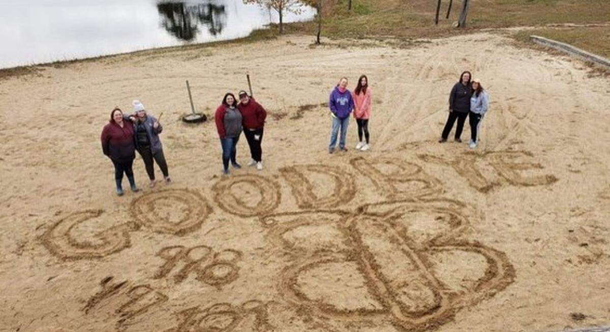 Leaders of Belleville Troops 998, 497 and 189 and their daughters say “goodbye” to Camp Butterfly near Farmington, Missouri. The Girl Scouts of Southern Illinois sold the property in October.