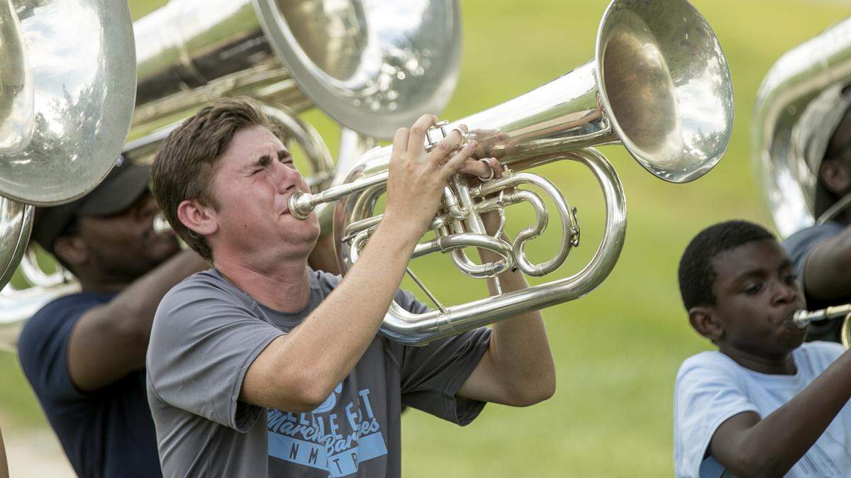 Belleville East high school senior Andrew Tufto plays his baritone with others in the brass section during the last day of band camp this summer. Belleville East and the marching bands at Alton, Collinsville, Granite City, Highland, Mascoutah, O’Fallon and Triad high schools will gather in St. Louis to compete in one of the nation’s most prominent championships, Music for All’s Bands of America St. Louis Super Regional Championship, presented by Yamaha. This will take place Friday, Oct. 18, and Saturday, Oct. 19.