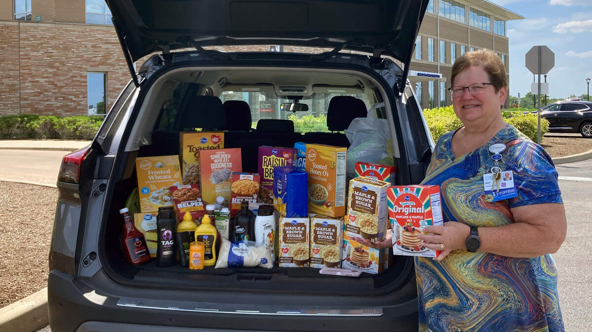 HSHS Home Care Illinois expresses its thanks to community members and colleagues at HSHS St. Joseph’s Hospital Highland who generously donated non-perishable food items during their recent food drive. Shown with the items collected during the drive from St. Joseph’s Hospital is Sheri Ernst, executive assistant. These items were donated to the Highland Area Christian Services Ministry (HACSM) food pantry to help those struggling with food insecurity.