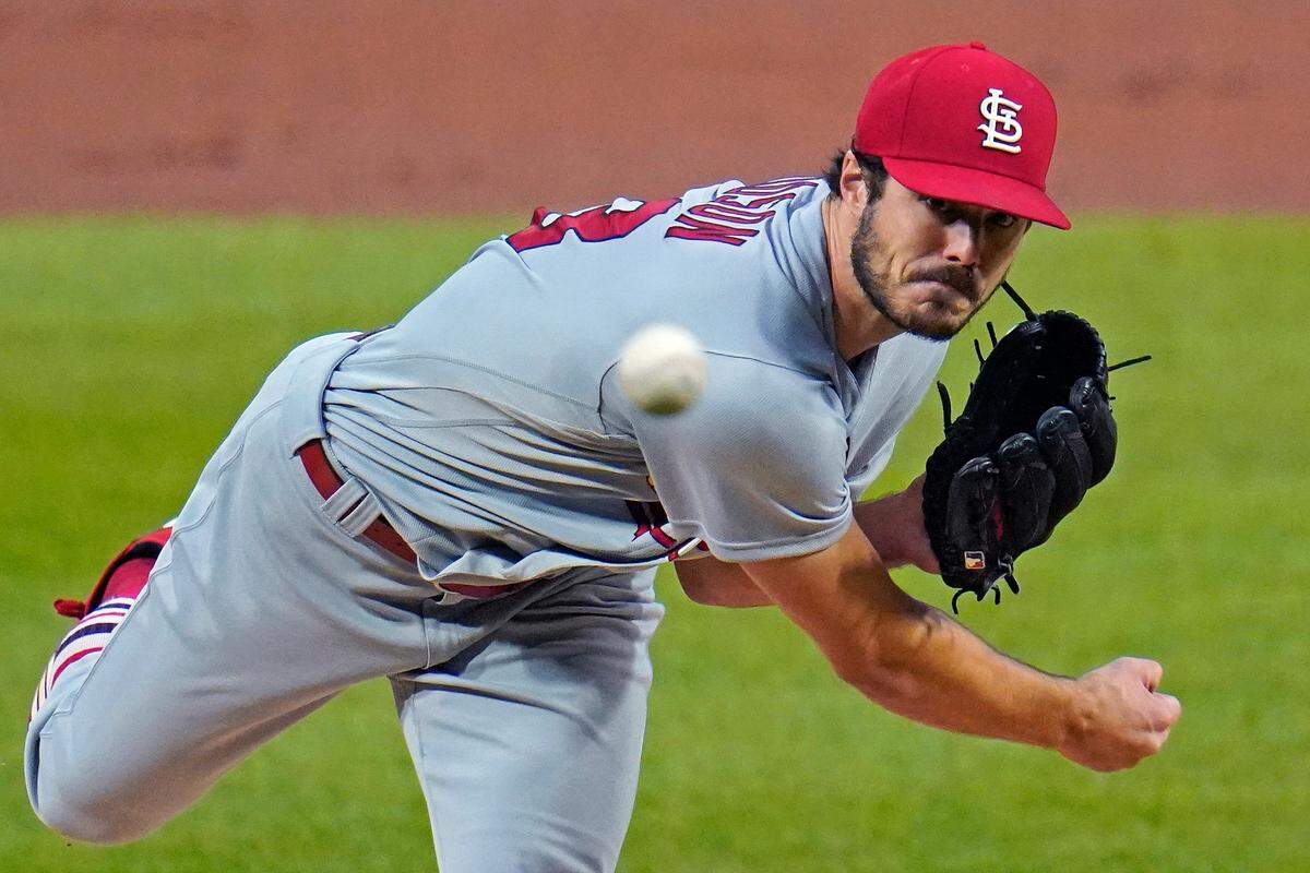 St. Louis Cardinals starting pitcher Dakota Hudson delivers during a game against Pittsburgh in 2020. For hurlers like Hudson, playing catch is maybe baseball’s most fundamental act, but finding a catch partner can be a delicate social dance inside the walls of a clubhouse.
