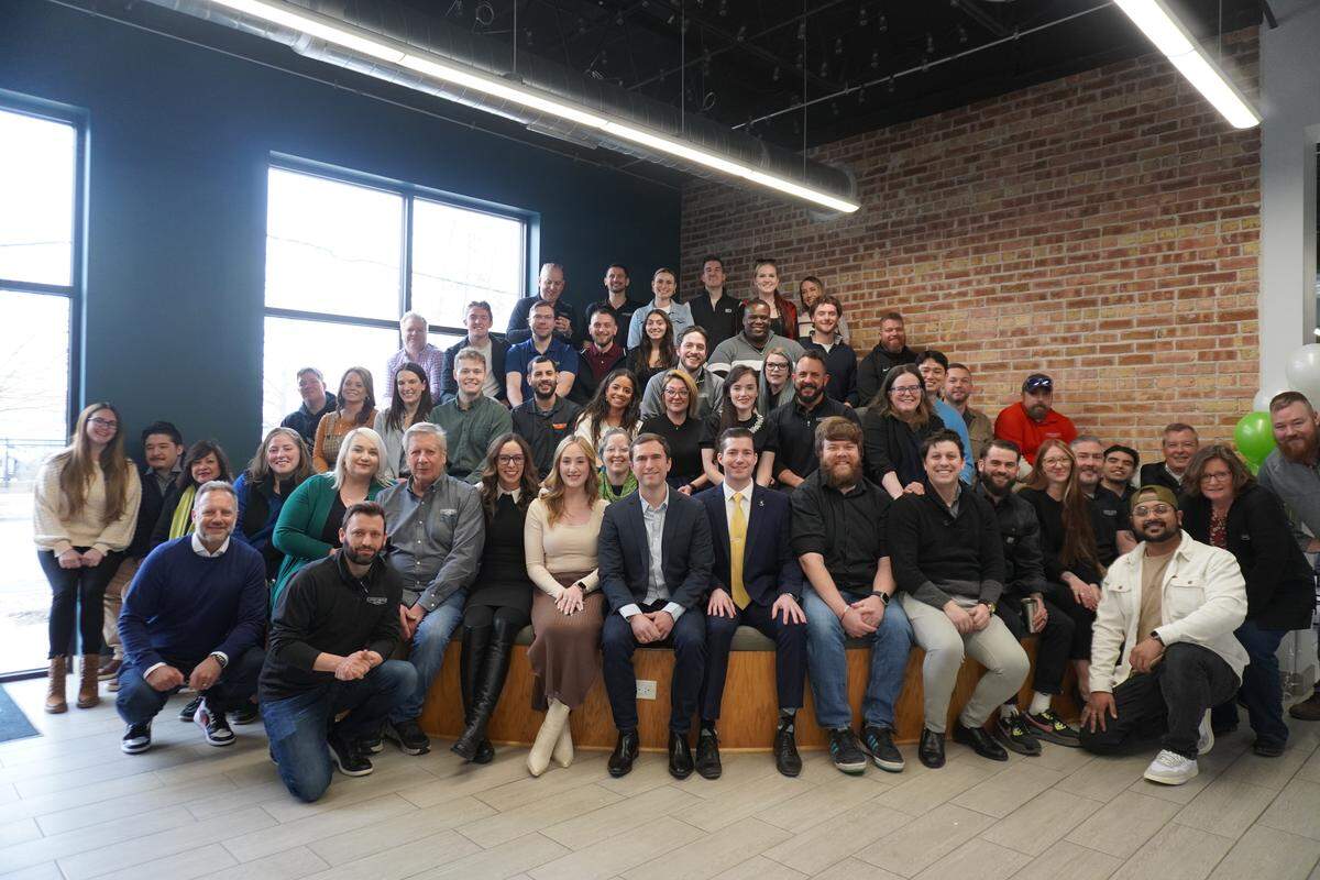 Employees of Lucky Lincoln Gaming, a Chicago-based video gambling terminal operator in Illinois, pose for a group photo. The Illinois Gaming Board issued the company a state license in 2014.
