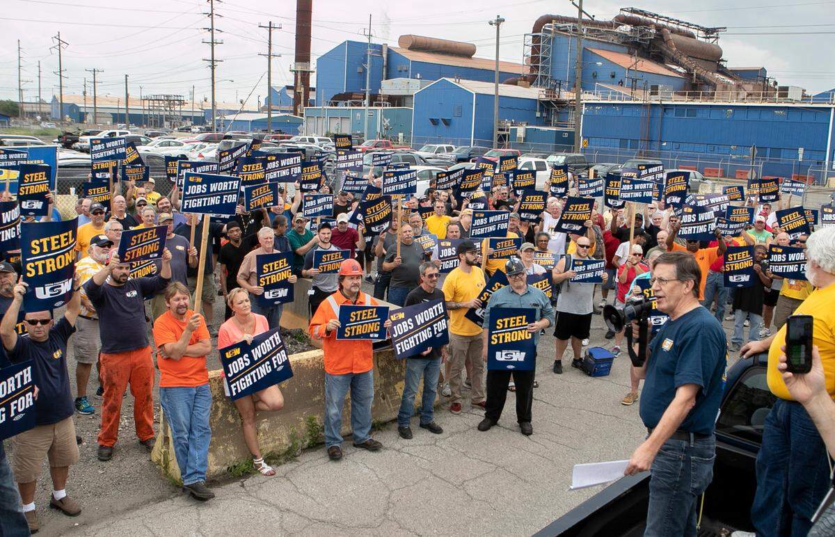 Blue-collar workers call for the reopening of the Granite City Works steel mill in 2023.