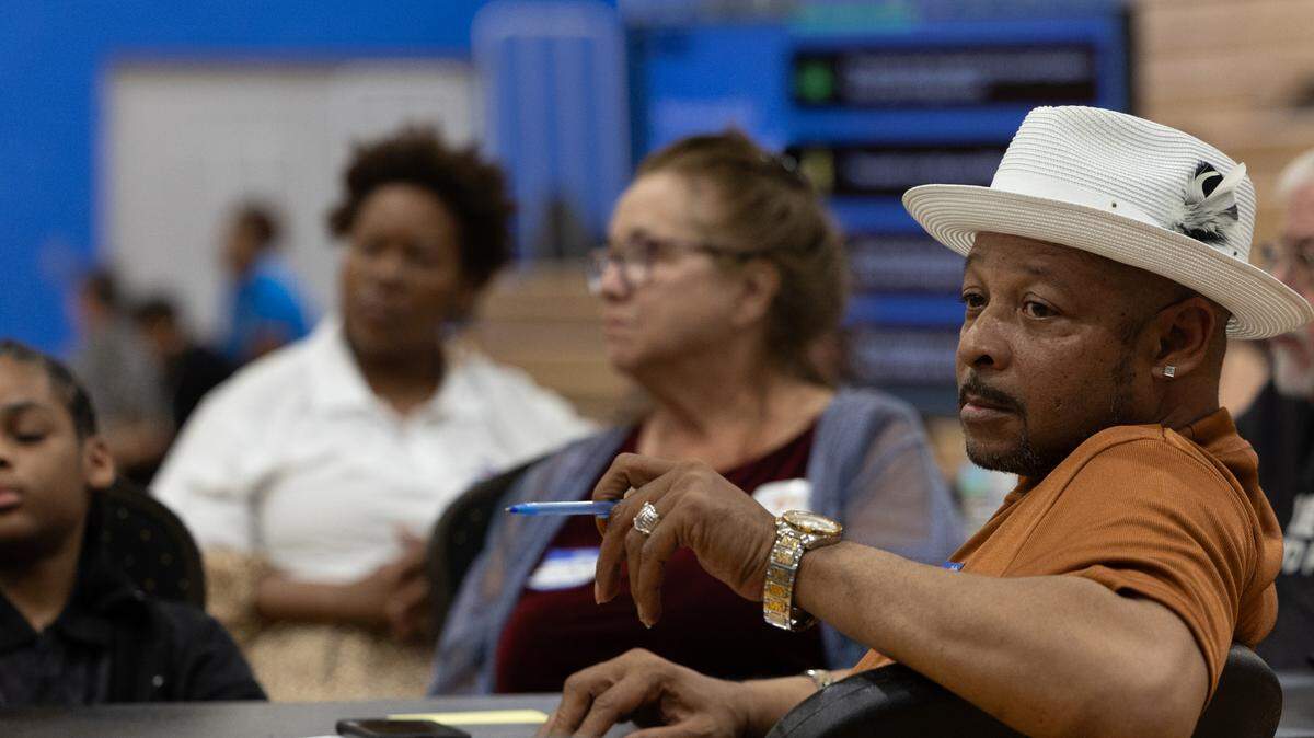 Terrance Taylor, a resident of Cahokia Heights, listens as EPA representatives hold a public meeting for community feedback at the Cahokia Fitness and Sports Complex on April 15, 2024. Taylor is a community advocate and vice president of Community Development Sustainable Solutions, a local nonprofit based in East St. Louis.