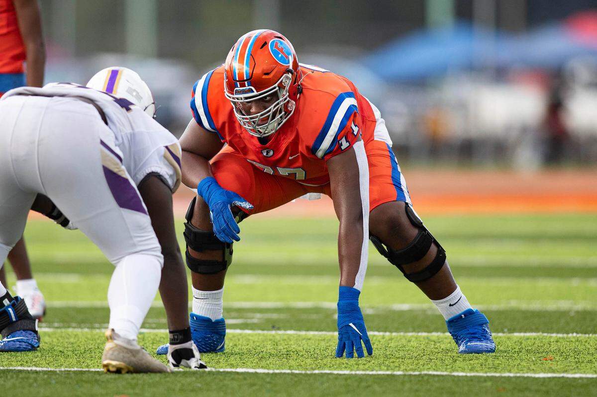 East St. Louis offensive lineman Brandon Henderson locks in for the next play during the annual Gateway Scholars Football Classic football game against CBC earlier this fall. On Tuesday, Henderson flipped his commitment from Iowa State to Illinois.