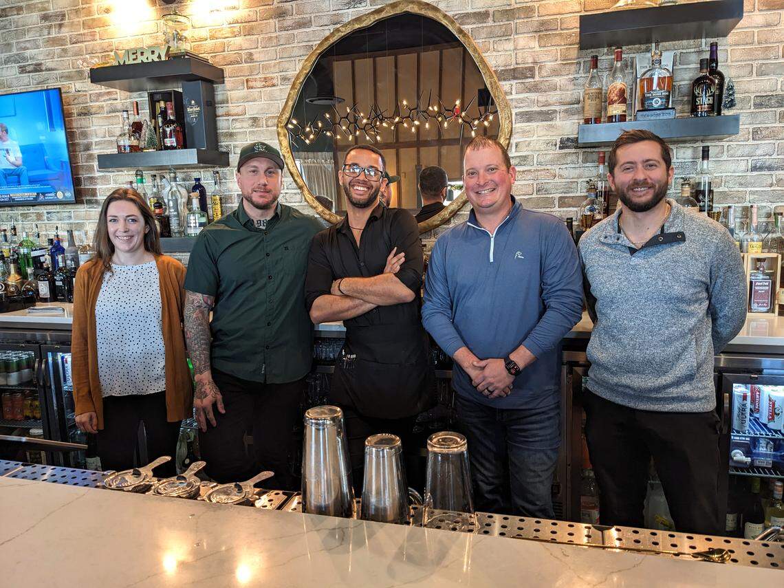 The crew at Brick + Bramble. From left: Catering Manager Sarah Buehrle, Food & Beverage Director Jake Koons, bartender C.J. Edwards, owner Ryan High, General Manager Alex Fink.