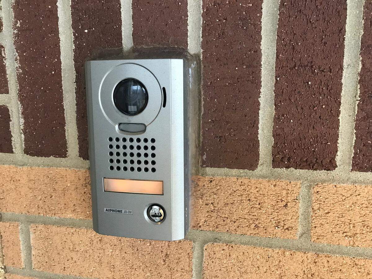 Exterior camera and doorbell communication surveillance system found at the main entrance to O'Fallon School District 90 Delores Moye Elementary at 1010 Moye School Rd. in O'Fallon.