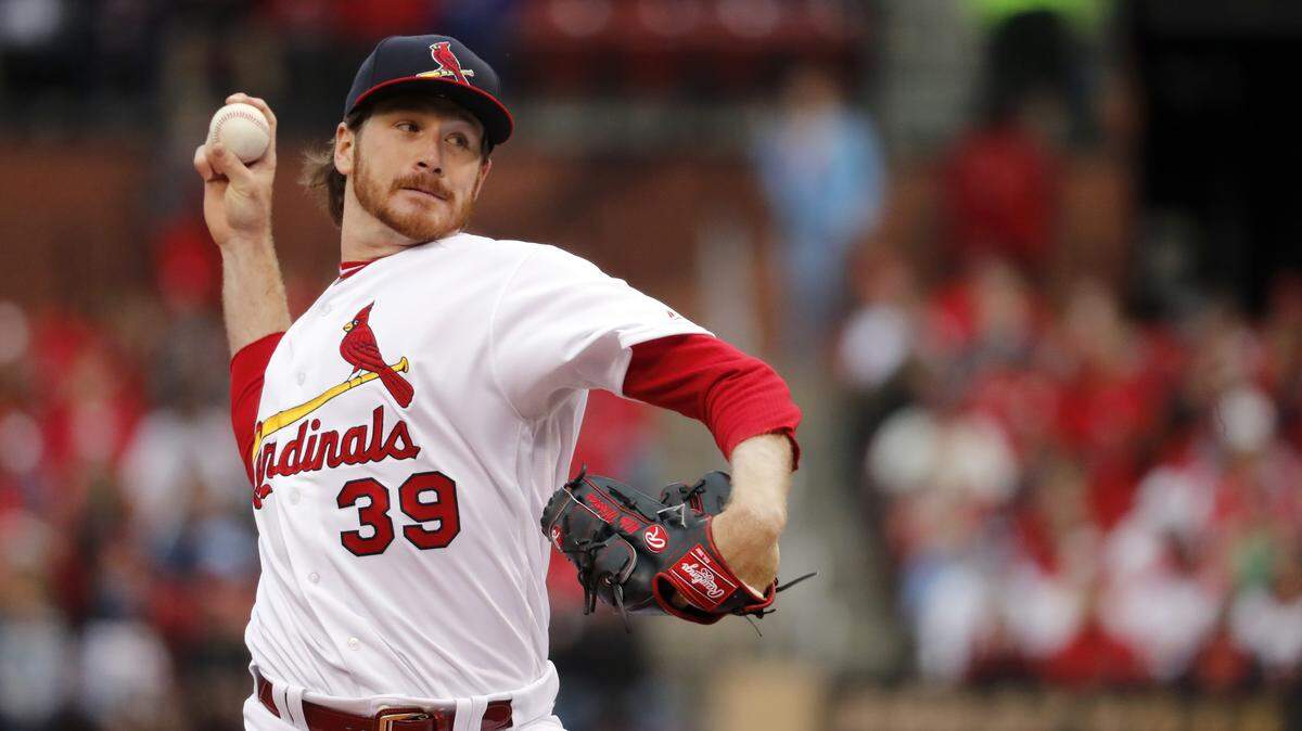 St. Louis Cardinals starting pitcher Miles Mikolas throws during the first inning of a baseball game against the Cincinnati Reds on Sunday, April 22, 2018, in St. Louis.