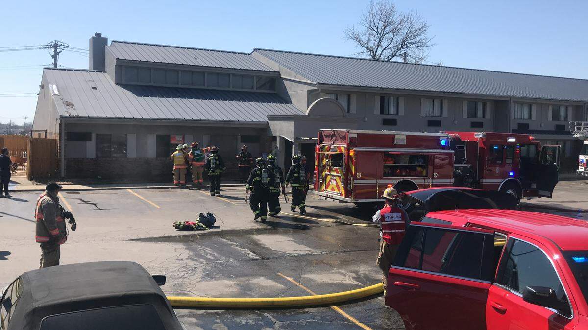 Firefighters from seven departments in southwestern Illinois respond to a fire Saturday, April 3, 2021, at the Days Inn and Suites hotel in Caseyville.