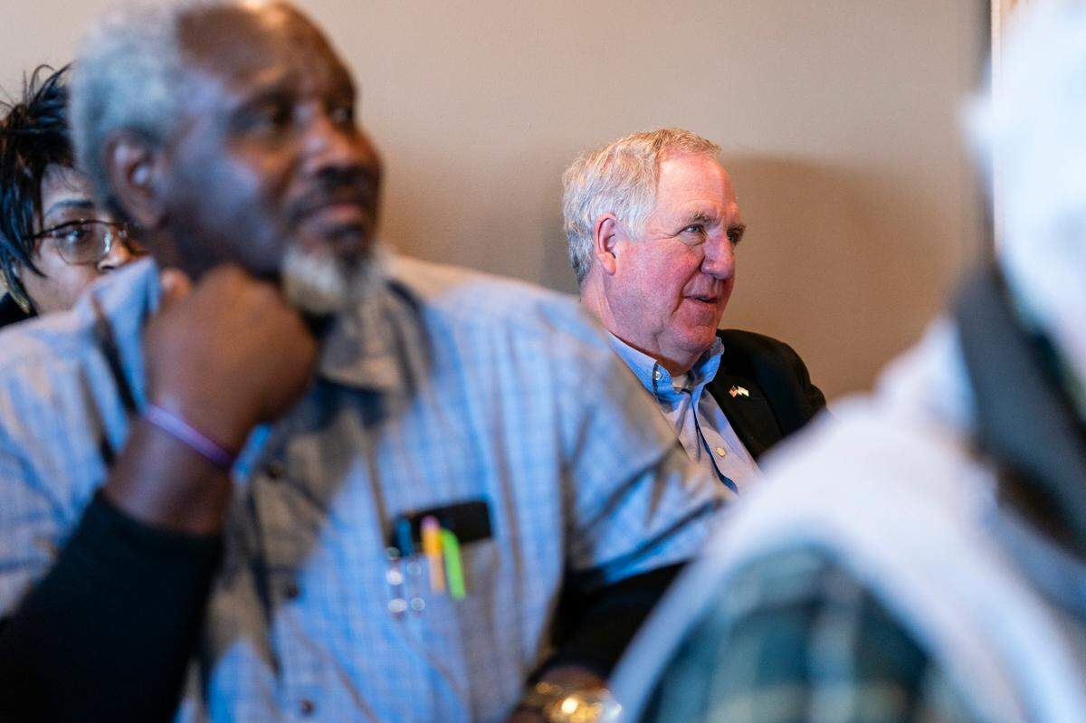 Former US. Representative John Shimkus, R-Collinsville, listens as U.S. Representative Mike Bost, R-Murphysboro, not pictured, speaks during a campaign event on Saturday, Feb. 17, 2024, at Eckert’s Country Restaurant in Belleville. Bost is facing a primary challenge in the 12th District of Illinois by former state representative and gubernatorial candidate, Darren Bailey.