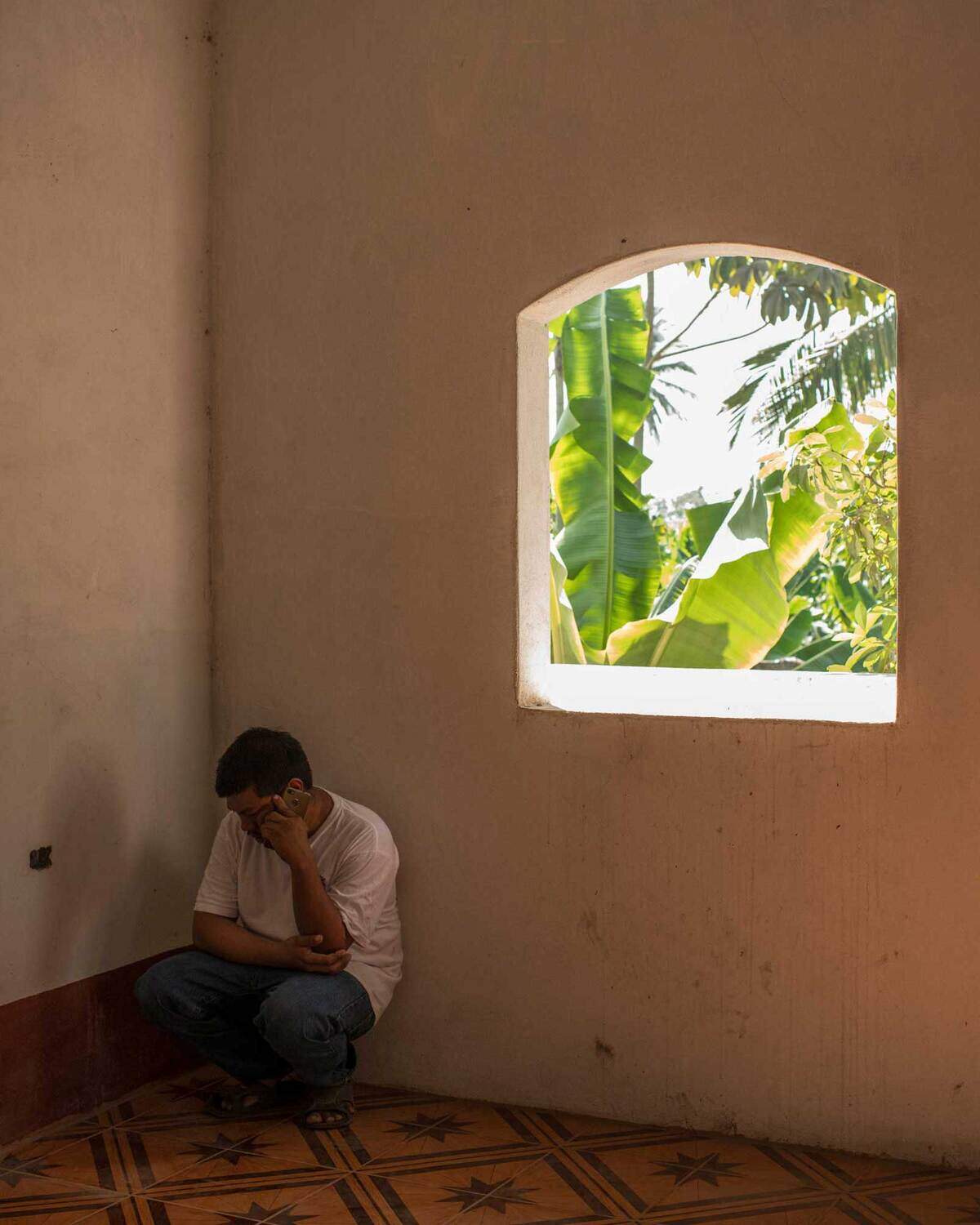 Jorge Matias says he is adjusting to life in Guatemala, the country he left as a teenager in 2003. He now lives with relatives in a house built with the money he earned in Chicago and sent to his mother.