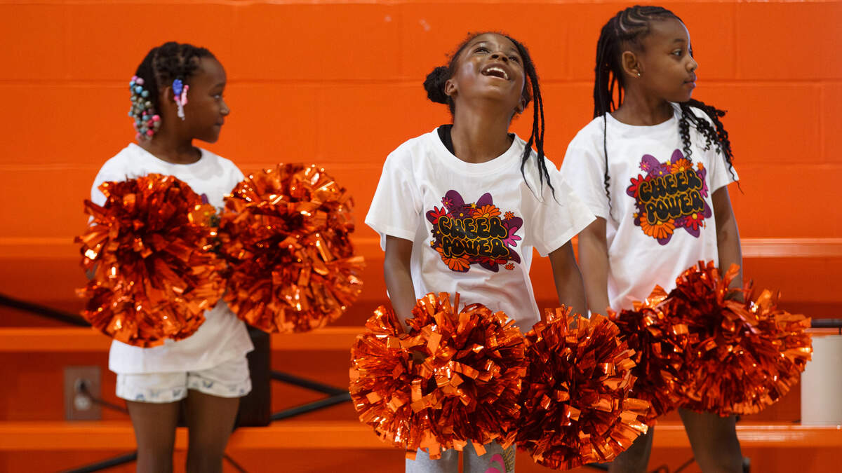 Treintee Holman, 8, participates in a summer cheer camp, one of many resources which stand to be affected following the U.S. Department of Education’s decision to terminate community school grant funding, at Annette Officer Elementary School in East St. Louis on Wednesday, June 24, 2026. 