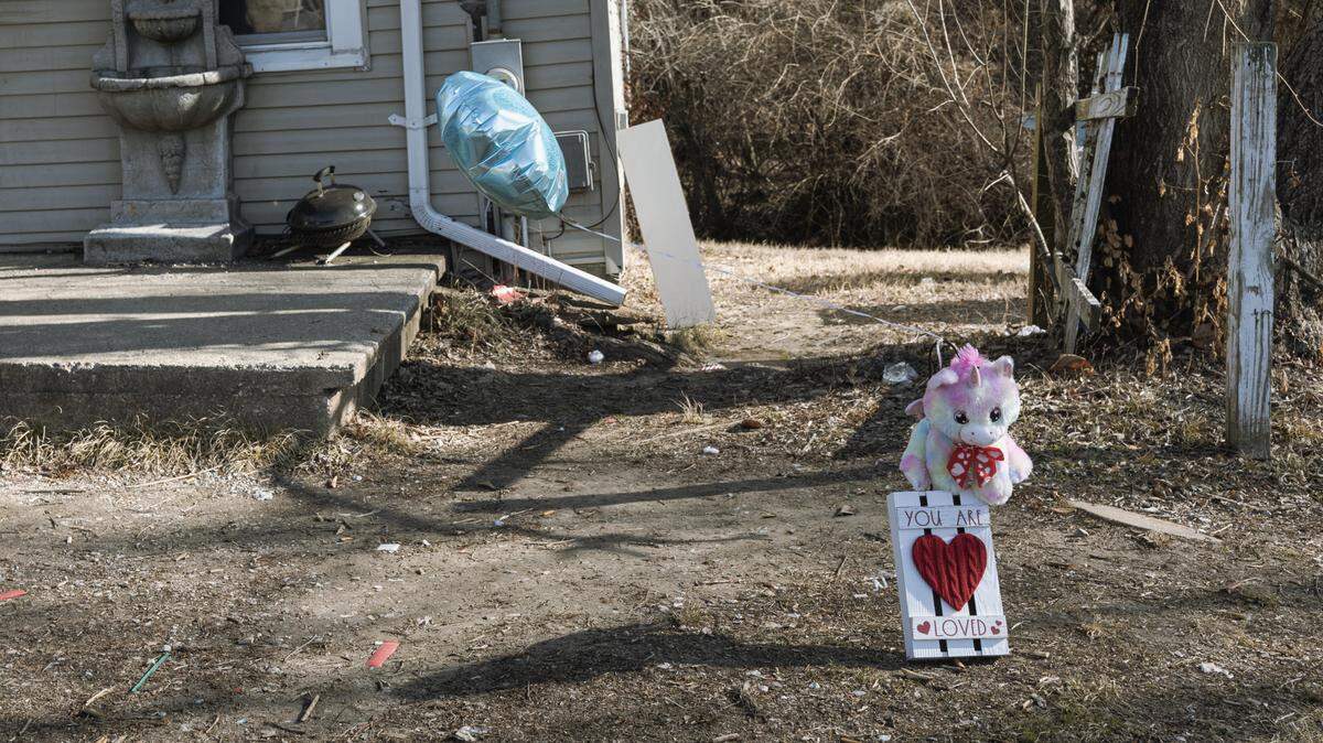 A memorial outside a house in the 900 block of Highland Avenue in Alton, Ill. on Feb. 14, 2024.
