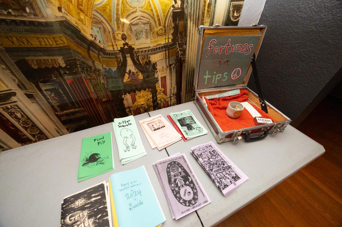 Though the space itself conducts no business at their location, visitors and show-goers are encouraged to donate to touring acts, like this one set up for touring puppeteer Mindi Romani.