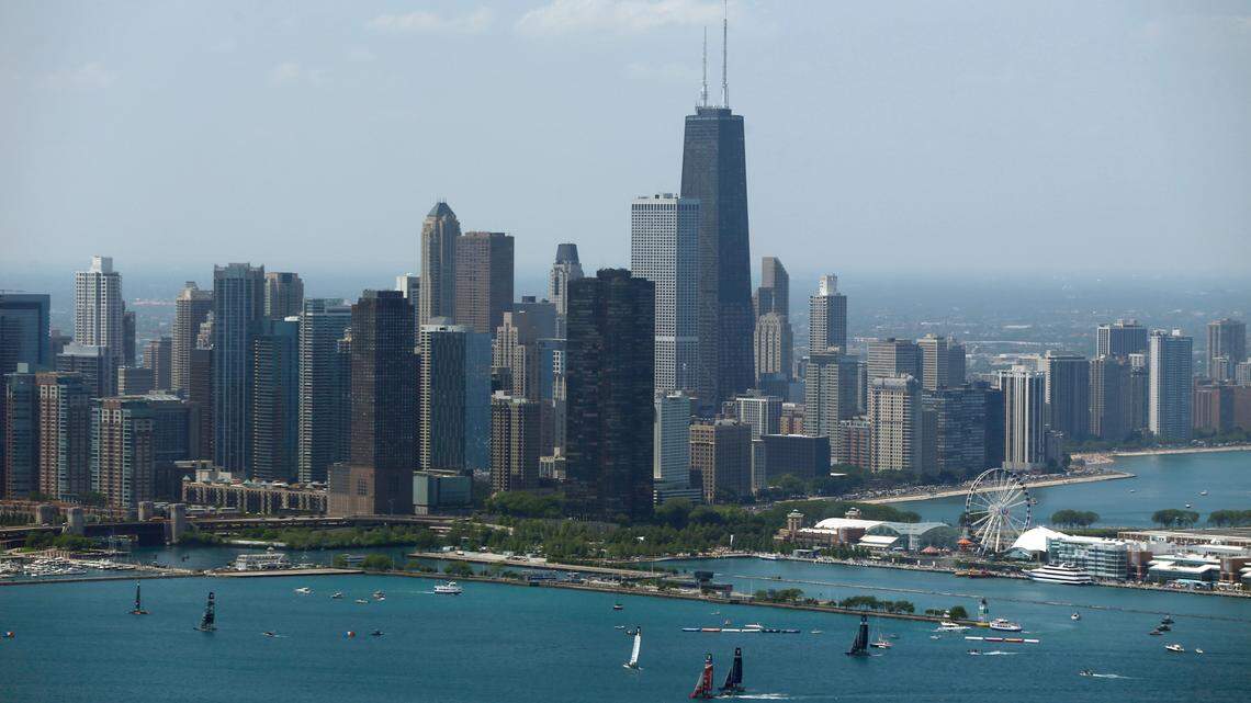 Several of Illinois’ wealthiest residents reside in Chicago. Here’s what to know about those named to the 2023 Forbes magazine list of the richest people on the planet. (AP Photo/Kiichiro Sato, File)