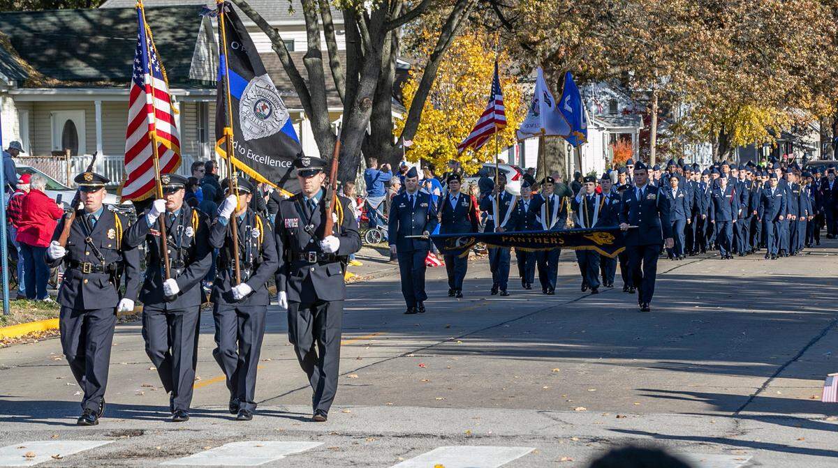 Members of the O’Fallon Police Department and O’Fallon High School Junior Air Force ROTC march in the Veterans Day parade in O’Fallon last year. The City of O’Fallon again will hold a Veterans Day observance beginning at 11 a.m. Friday, Nov. 11, at First Baptist Church, 111 E. Highway 50.