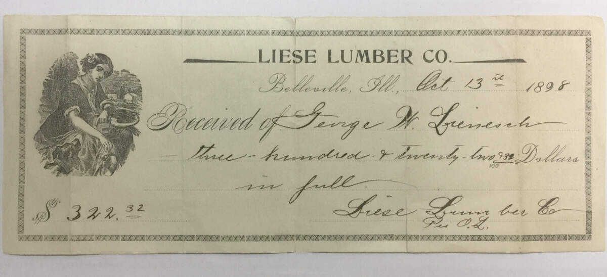 This receipt is displayed at Liese Lumber Co. in Belleville, showing that a local resident could buy all the lumber he needed to build a house for $322 in 1898. The current owners aren’t sure if there’s any significance to the image of the woman and dog.
