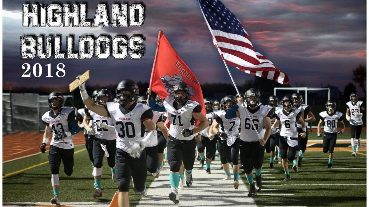 While wearing teal socks and armbands in honor of Erica Robertson, Highland High School football players carry their flags onto the field at the start of their game against Waterloo on Oct. 5.