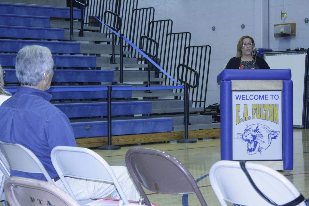 Kholoud Almofleh speaks at Monday night's O'Fallon School District 90 Board of Education meeting at Fulton Jr. High. She has called for the resignation of board member Steve Springer, who under fire for controversial comments he made about transgender and Muslim students in emails he sent in 2016. Almofleh is a program aid at Delores Moye Elementary School, a teacher at the Belleville Mosque and Islamic Education Center, and a grandparent to children in the school district.