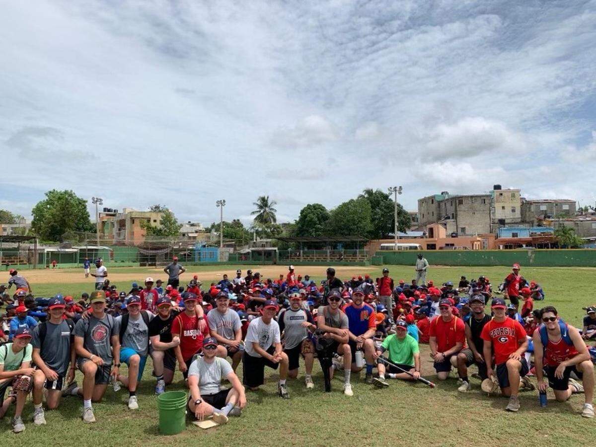 For the past 10 years, Highland High School baseball coach Joel Hawkins has taken a week-long trip each summer to the Dominican Republic to help conduct baseball camps with several American and Dominican coaches and current HHS players and former players. Pictured are all the campers and coaches who helped with the camp on the last day of the 2022 camp.