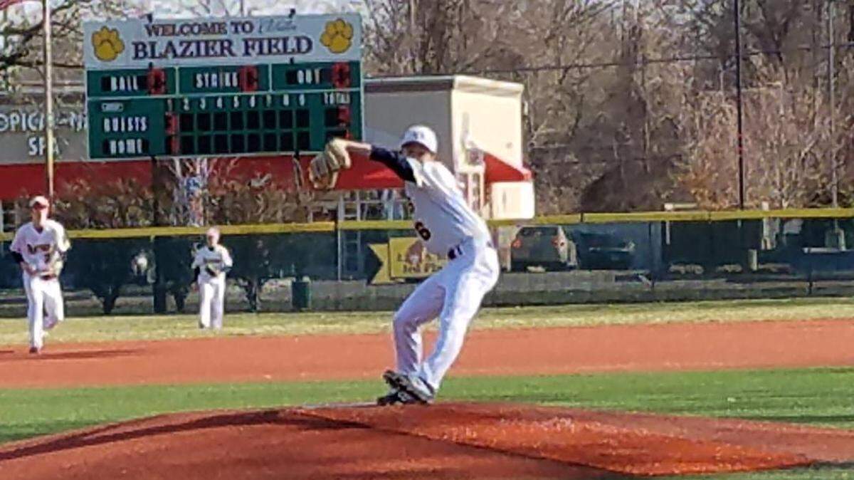 O’Fallon hurler Ben Koenig delivers a pitch during the Panthers game against Highland on March 21. Koenig earned the win in relief, as OTHS rallied past the Bulldogs 10-3.