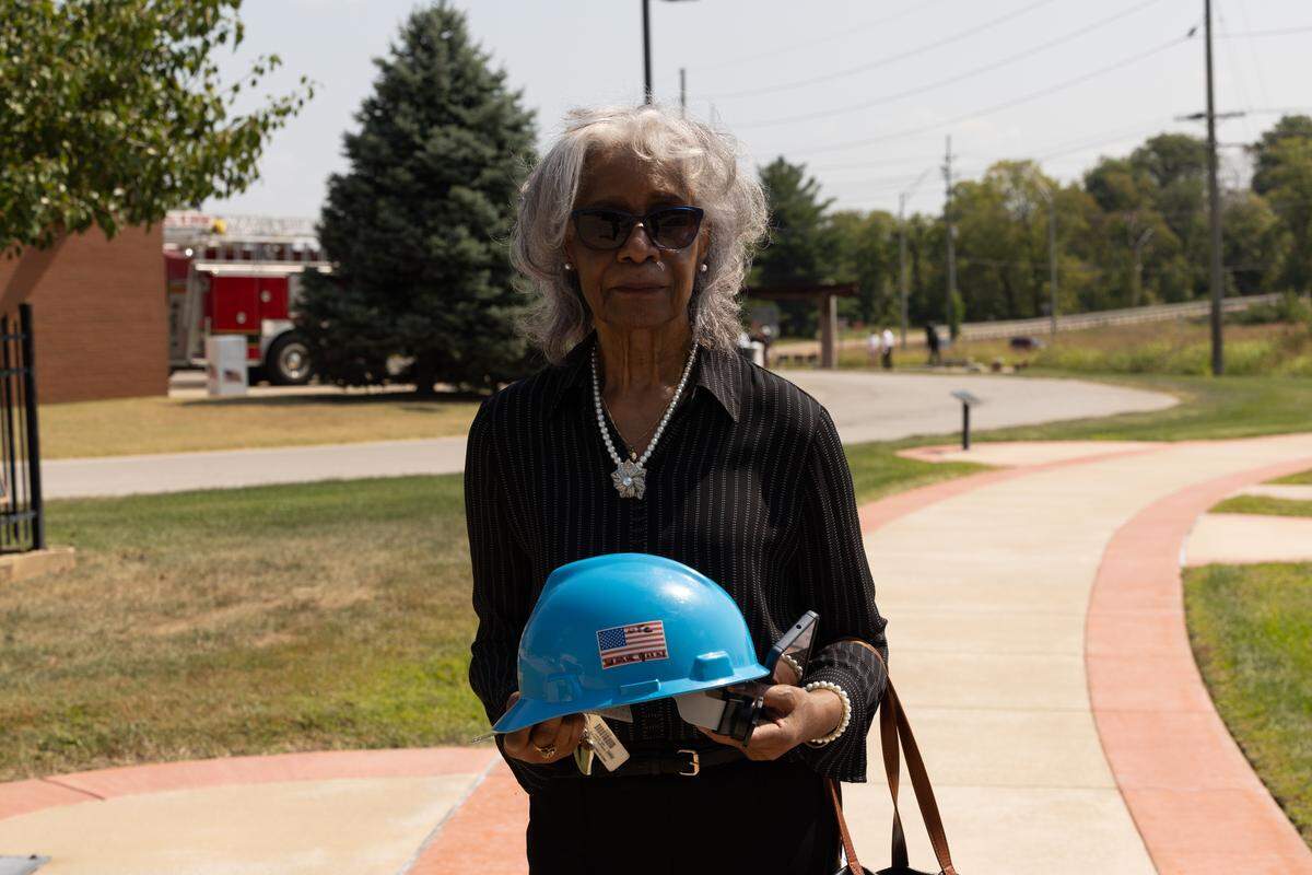 Willie Mae Ramirez holds up a helmet retrieved from Ground Zero after the September 11th attacks. Ramirez is a retired paralegal and says her office was “very close” to the World Trade Center. “It was horrific,” Ramirez said of the fateful day, “Just horrific.”