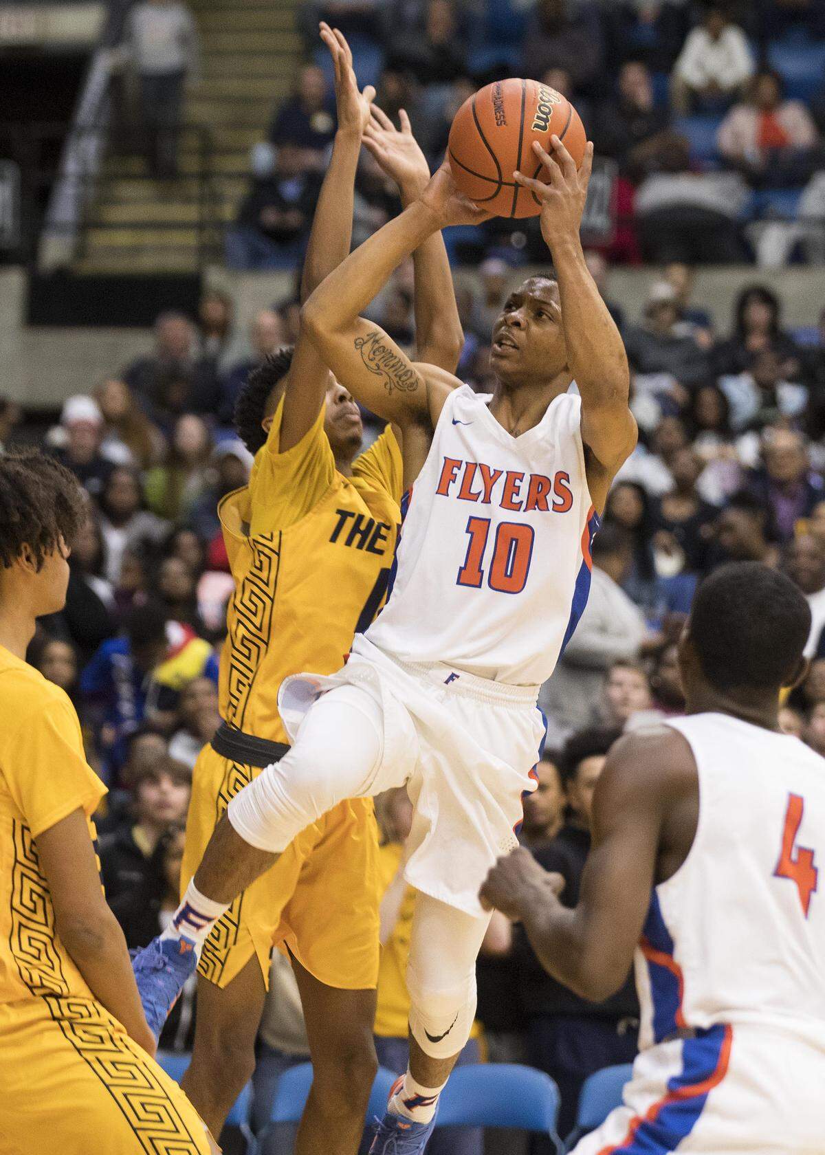 Cornelius Leflore attempts a shot against Springfield Southeast in the IHSA Class 3A Springfield Super-Sectional Tuesday.