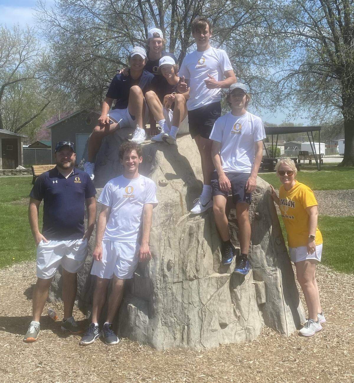 The O'Fallon boys tennis team is pictured with coach Erin Thoman after winning three matches at Troy Park on Saturday, April 23.