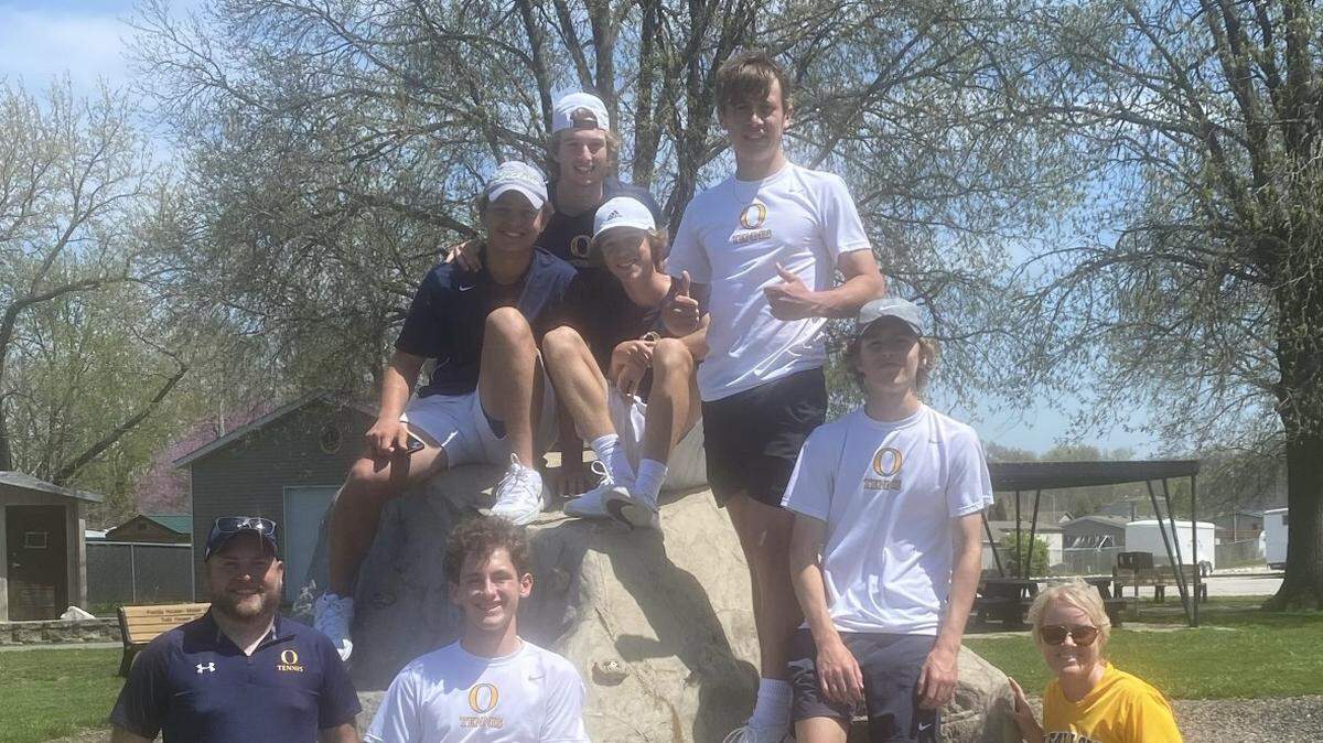 The O'Fallon boys tennis team is pictured with coach Erin Thoman after winning three matches at Troy Park on Saturday, April 23.