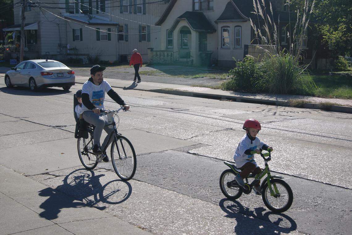 Riders in the Tour de Belleville cruise on Main Street Saturday.