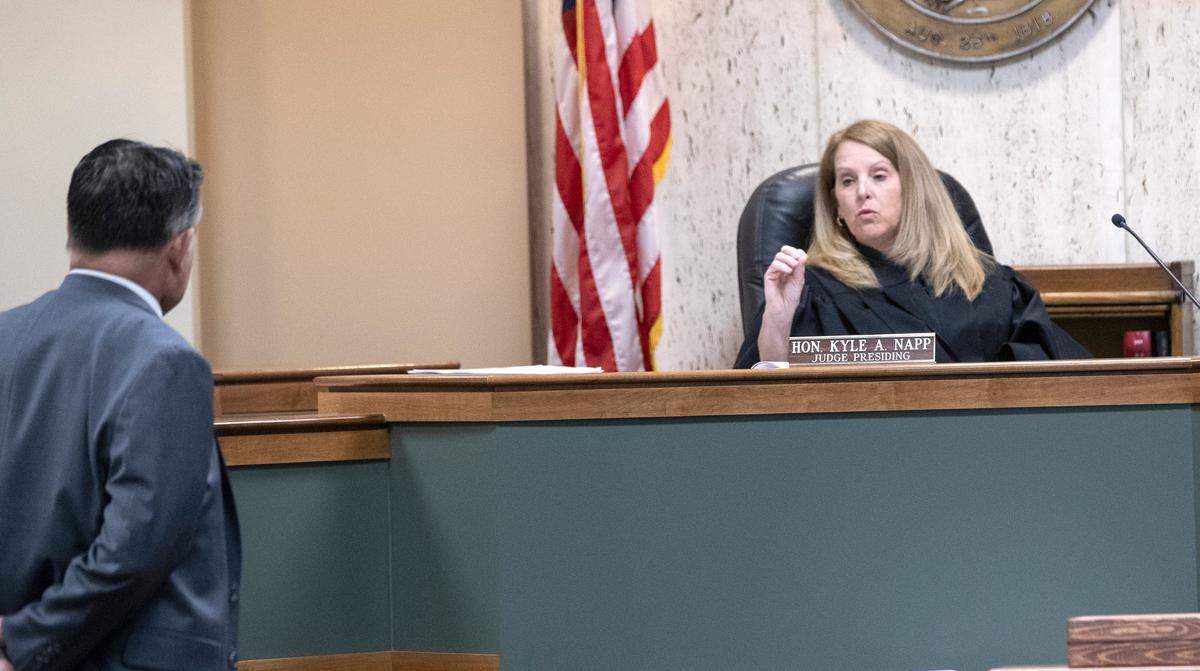 Defense attorney Steve Williams listens to Judge Kyle Napp on Tuesday during a sentencing hearing for Amber Hampshire, who pleaded guilty to involuntary manslaughter, in Madison County Circuit Court.