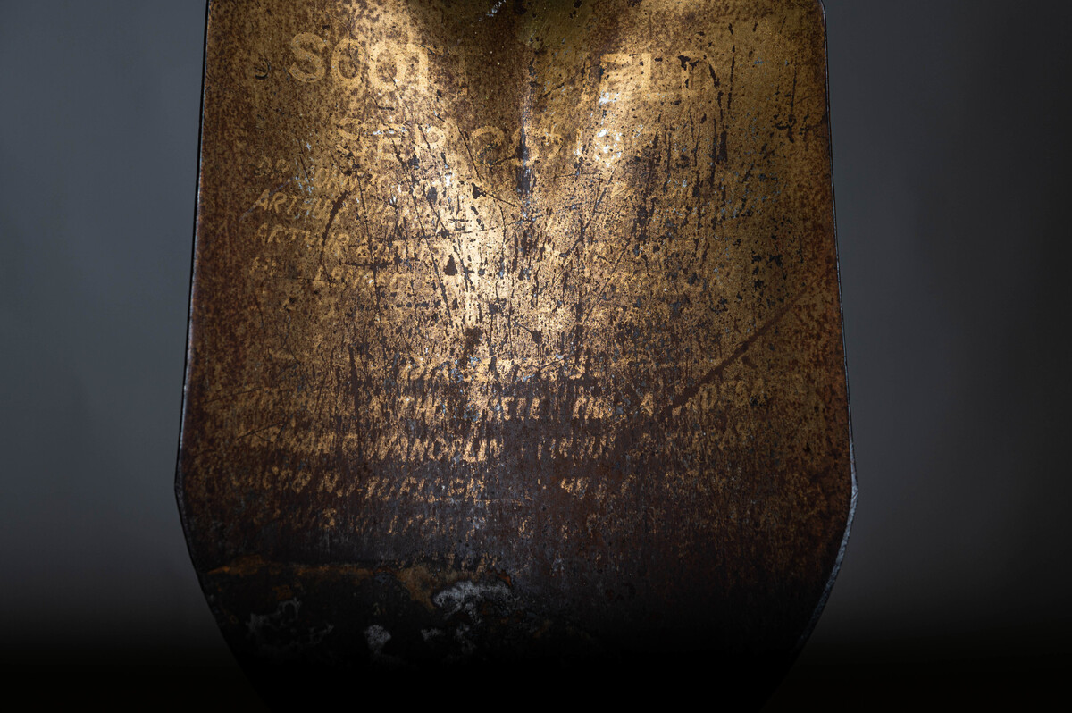 The shovel used during the Sept. 26, 1921, ground breaking ceremony of the Airship Hangar at Scott Air Force Base, Illinois, is photographed April 29, 2022. After being lost for more than 100 years, the shovel was found during an estate sale by an antique store owner who contacted the 375th Air Mobility Wing. Mark Wilderman, 375th AMW historian, then completed the necessary paperwork to procure the artifact and bring it back to the installation.