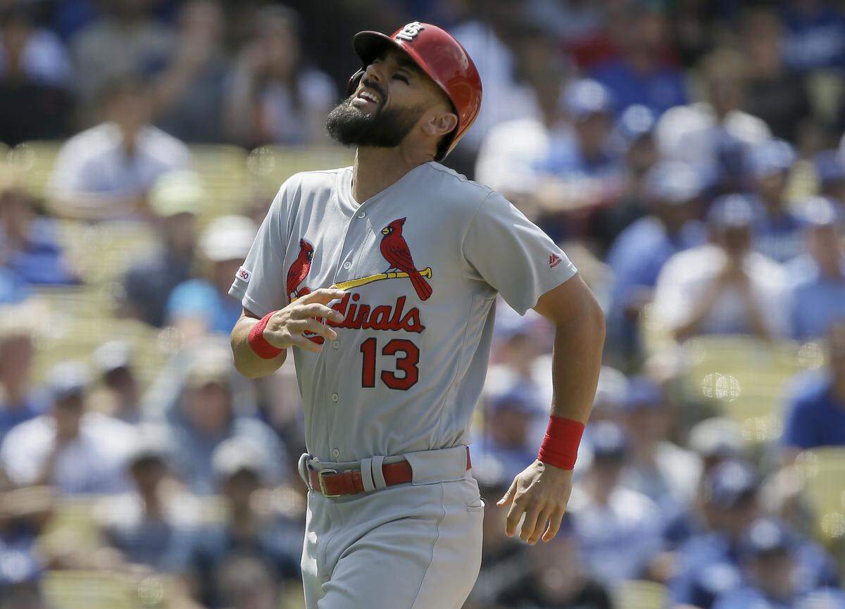 St. Louis Cardinals’ Matt Carpenter reacts after he gets hit by a pitch during the ninth inning of a baseball game against the Los Angeles Dodgers in Los Angeles, Wednesday, Aug. 7, 2019. (AP Photo/Alex Gallardo)