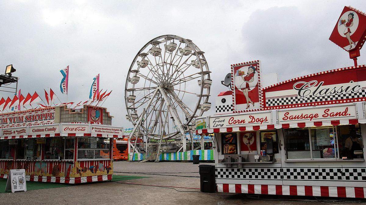 Food stands frame the ferris wheel at the St. Clair County Fair in this 2014 file photo.