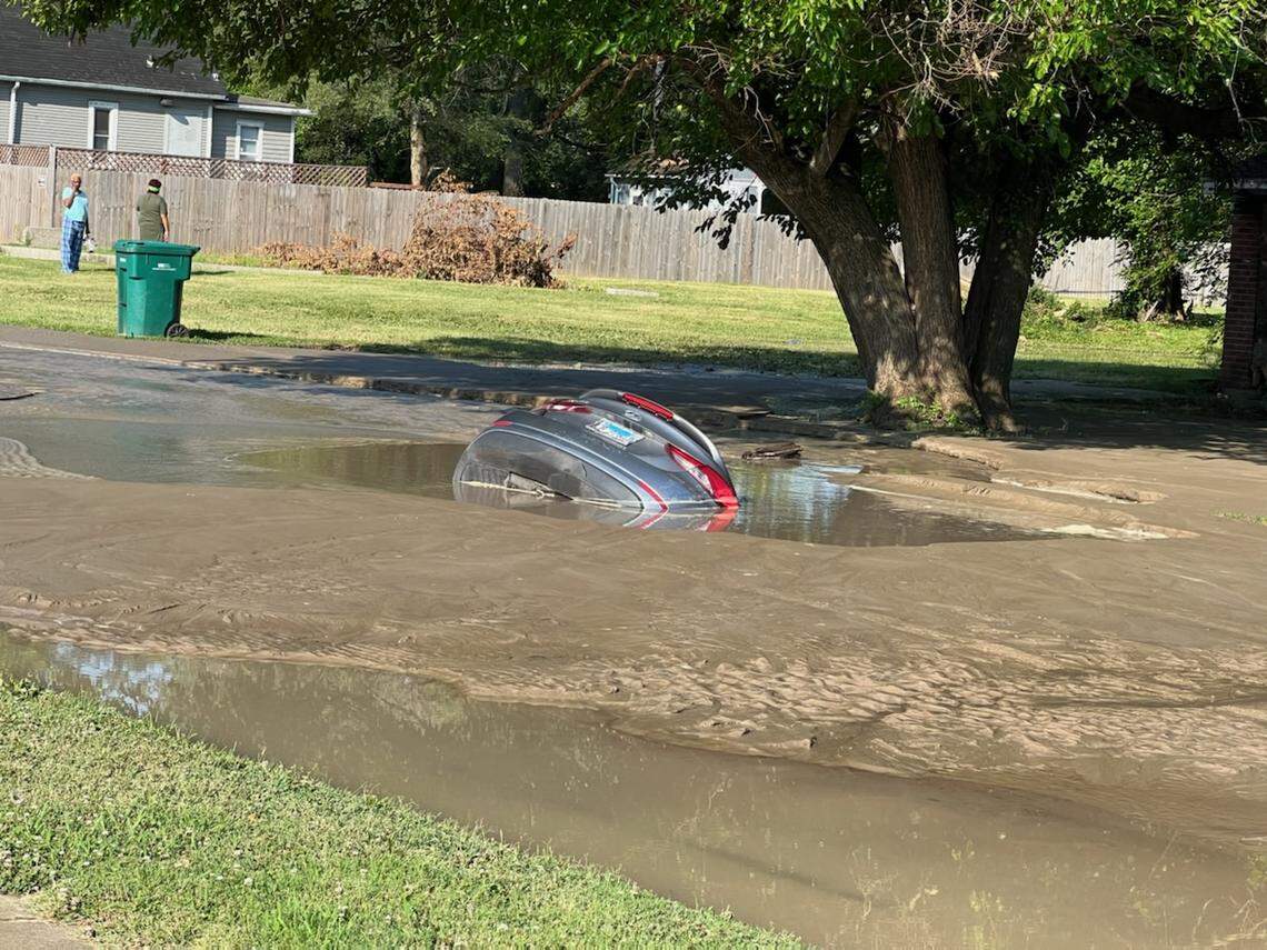 Local activists said this photo shows a car sinking into a hole in the road on Monday, July 4, 2022, in the 700 block of North 32nd Street in East St. Louis.