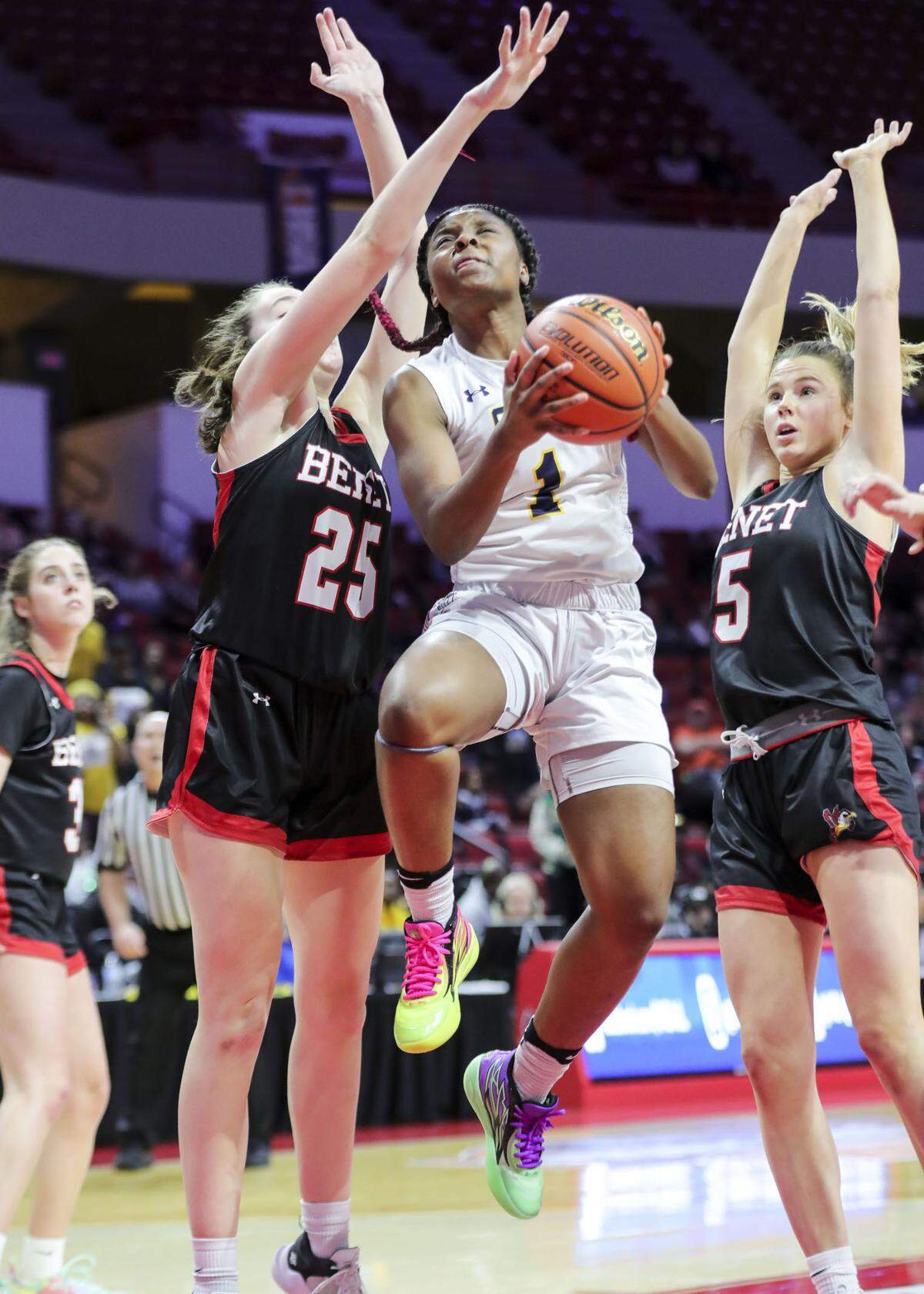 O’Fallon’s Jailah Pelly drives to the basket during Saturday’s IHSA Class 4A state championship game against Lisle Benet Academy at CEFCU Arena (formerly Redbird Arena) on the campus of Illinois State University. O’Fallon ultimately prevailed 62-57 to claim the state title.