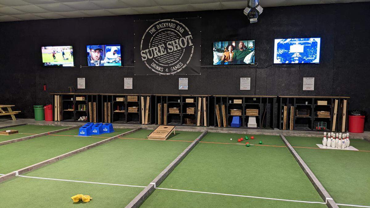 Players can swap out the different games in the activities area at Sure Shot.