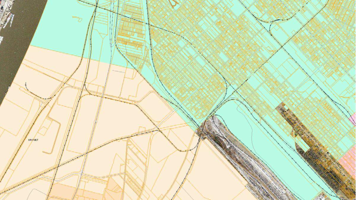 East St. Louis land (in teal) is immediately adjacent to the Monsanto plant and industrial area in Sauget (in peach). This map image was captured June 17, 2020, using the St. Clair County Geographic Information System viewer. It was included in a federal lawsuit the city filed seeking fines over alleged pollution from the plant.