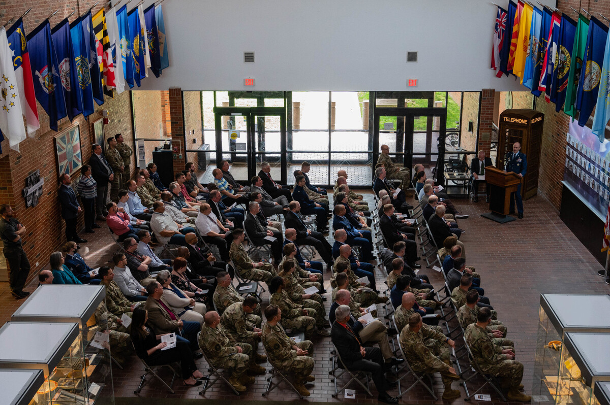 Airmen attend a timeline induction ceremony honoring 67th Cyberspace Wing and 688th Cyberspace Wing’s contributions towards Air Force Cyberspace and Communication capabilities, at the Air Force Cyber Heritage Center at HQ Cyberspace Capabilities Center on Scott Air Force Base. The four tiles honored during the ceremony will now hang on the Heritage Center’s timeline wall, a 30-foot wall dedicated to focusing on Air Force cyberspace and information dominance.